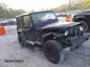 2001 Jeep Wrangler SE with VIN 1J4FA29P01P350847, listed as a IAAI auction lot 42821806 with 205,522 mi miles and . Bid and sale history available at DreamBid. Image 1.