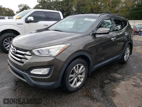 2014 Hyundai Santa Fe с VIN 5XYZU3LA3EG212720, выставлен на аукционе Copart как лот 82893124 с пробегом 134 404 миль миль и Списание • Salvage title. История ставок и продаж доступна на DreamBid. Изображение 1.