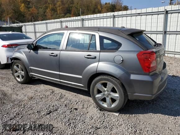 2011 Dodge Caliber Uptown with VIN 1B3CB9HB4BD254518, listed as a Copart auction lot 78128554 with 171,655 mi miles and Salvage title. Bid and sale history available at DreamBid. Image 2.