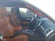 2014 Jeep Grand Cherokee SRT-8 z VIN 1C4RJFDJ4EC498445, wystawiony jako IAAI lot #42817548 z przebiegiem 115 436 mil mil oraz . Historia ofert i sprzedaży dostępna na DreamBid. Obrazek 5.