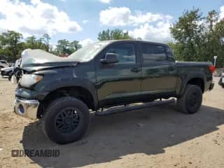 2012 Toyota Tundra с VIN 5TFDY5F19CX264286, выставлен на аукционе Copart как лот 70756645 с пробегом 94 151 миль миль и Списание • Salvage title. История ставок и продаж доступна на DreamBid. Изображение 1.