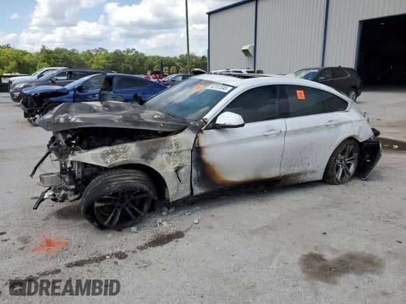 2017 BMW 4 Series 440i with VIN WBA4E3C55HG187098, listed as a Copart auction lot 50761545 with Not provided miles and Salvage title. Bid and sale history available at DreamBid. Image 1.