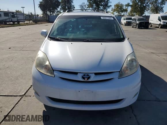 2010 Toyota Sienna XLE с VIN 5TDYK4CC3AS310667, выставлен на аукционе Copart как лот 86077205 с пробегом 184 017 миль миль и Списание • Salvage title. История ставок и продаж доступна на DreamBid. Изображение 5.