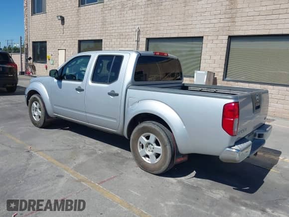 2006 Nissan Frontier LE with VIN 1N6AD07U56C472233, listed as a IAAI auction lot 43039519 with 123,029 mi miles and . Bid and sale history available at DreamBid. Image 3.
