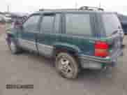 1993 Jeep Grand Cherokee Limited z VIN 1J4GZ78S1PC525798, wystawiony jako IAAI lot #42572328 z przebiegiem 197 551 mil mil oraz . Historia ofert i sprzedaży dostępna na DreamBid. Obrazek 3.