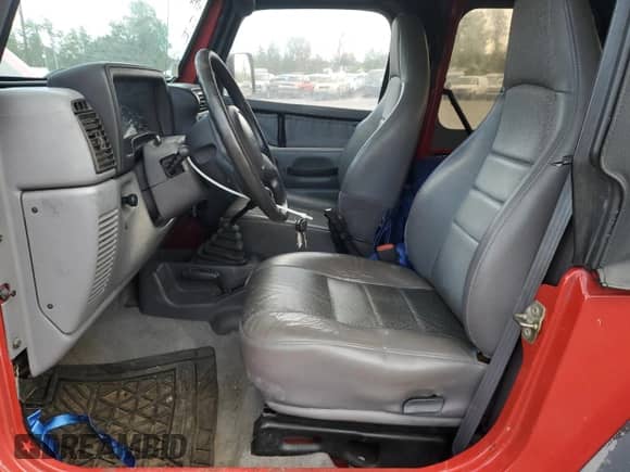 1998 Jeep Wrangler SE with VIN 1J4FY29P8WP767006, listed as a Copart auction lot 55603315 with 146,169 mi miles and Salvage title. Bid and sale history available at DreamBid. Image 7.