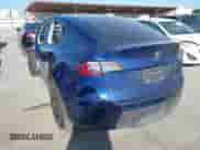 2022 Tesla Model Y Long Range z VIN 7SAYGDEE9NF443673, wystawiony jako IAAI lot #42878246 z przebiegiem 65 689 mil mil oraz . Historia ofert i sprzedaży dostępna na DreamBid. Obrazek 3.