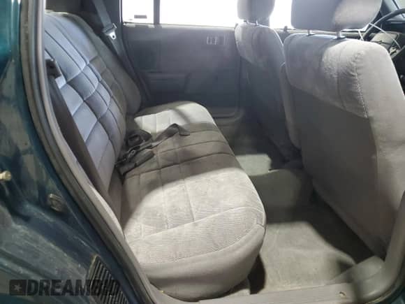 1994 Dodge Spirit with VIN 3B3AA4638RT310022, listed as a Copart auction lot 63479515 with 157,435 mi miles and Salvage title. Bid and sale history available at DreamBid. Image 10.