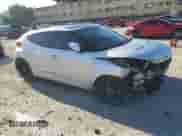 2013 Hyundai Veloster w/Black Int z VIN KMHTC6AD9DU136551, wystawiony jako Copart lot #83799205 z przebiegiem 101 623 mil mil oraz Szkoda całkowita • Salvage title. Historia ofert i sprzedaży dostępna na DreamBid. Obrazek 4.