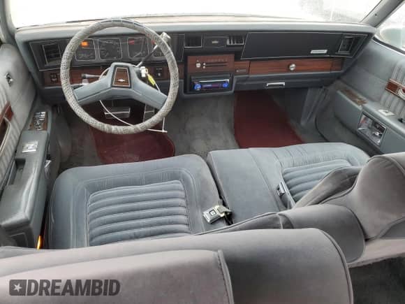 1987 Chevrolet Caprice с VIN 1G1BU51H5HX102002, выставлен на аукционе Copart как лот 58674045 с пробегом 82 659 миль миль и Чистый • Clean title. История ставок и продаж доступна на DreamBid. Изображение 8.