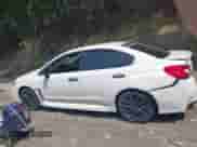 2017 Subaru WRX z VIN JF1VA1B62H9826999, wystawiony jako IAAI lot #42376573 z przebiegiem 79 419 mil mil oraz . Historia ofert i sprzedaży dostępna na DreamBid. Obrazek 14.