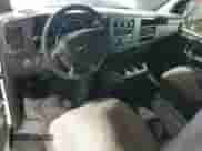 2014 Chevrolet Express Passenger LT с VIN 1GAZG1FG4E1187749, выставлен на аукционе Copart как лот 82086105 с пробегом 67 880 миль миль и Списание • Salvage title. История ставок и продаж доступна на DreamBid. Изображение 8.