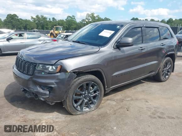 2017 Jeep Grand Cherokee Laredo with VIN 1C4RJEAG2HC813248, listed as a IAAI auction lot 43102698 with 162,220 mi miles and . Bid and sale history available at DreamBid. Image 2.