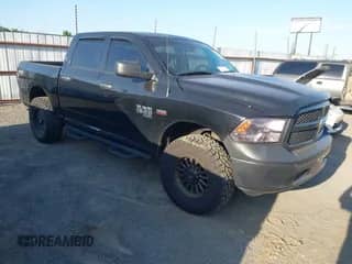 2021 Ram 1500 Tradesman z VIN 1C6RR7KT7MS555381, wystawiony jako IAAI lot #41973449 z przebiegiem 28 577 mil mil oraz . Historia ofert i sprzedaży dostępna na DreamBid. Obrazek 1.