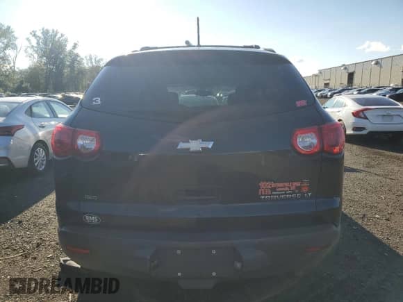 2012 Chevrolet Traverse 1LT z VIN 1GNKVGED2CJ212404, wystawiony jako Copart lot #83753315 z przebiegiem 202 648 mil mil oraz Szkoda całkowita • Salvage title. Historia ofert i sprzedaży dostępna na DreamBid. Obrazek 6.