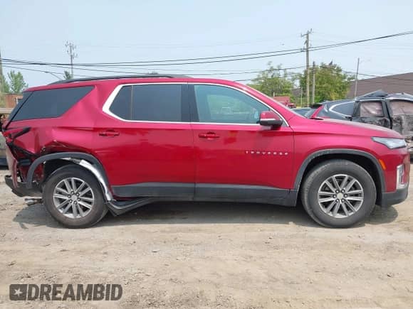 2023 Chevrolet Traverse LT Cloth z VIN 1GNERGKWXPJ310710, wystawiony jako IAAI lot #42405803 z przebiegiem 10 085 mil mil oraz . Historia ofert i sprzedaży dostępna na DreamBid. Obrazek 13.