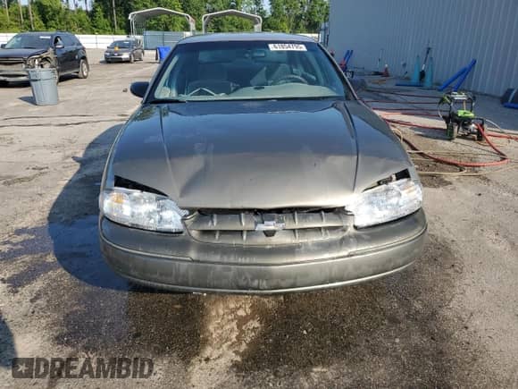1999 Chevrolet Lumina с VIN 2G1WL52M4X9197102, выставлен на аукционе Copart как лот 61854795 с пробегом 201 659 миль миль и Списание • Salvage title. История ставок и продаж доступна на DreamBid. Изображение 5.