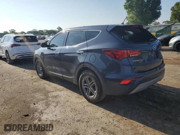 2018 Hyundai Santa Fe 2.4L с VIN 5NMZTDLB9JH095100, выставлен на аукционе Copart как лот 64850795 с пробегом 92 794 миль миль и Списание • Salvage title. История ставок и продаж доступна на DreamBid. Изображение 2.