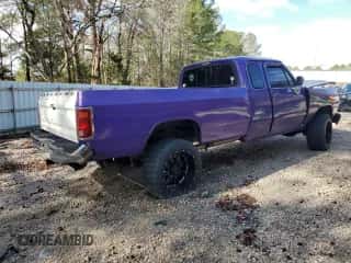 1992 Dodge D/W 250 with VIN 3B7KM23C8NM516058, listed as a Copart auction lot 46529115 with 279,999 mi miles and Salvage title. Bid and sale history available at DreamBid. Image 3.