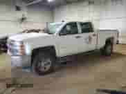 2015 Chevrolet Silverado 2500HD Work Truck z VIN 1GC1KUEG5FF652954, wystawiony jako Copart lot #56283235 z przebiegiem 235 014 mil mil oraz Szkoda całkowita • Salvage title. Historia ofert i sprzedaży dostępna na DreamBid. Obrazek 1.