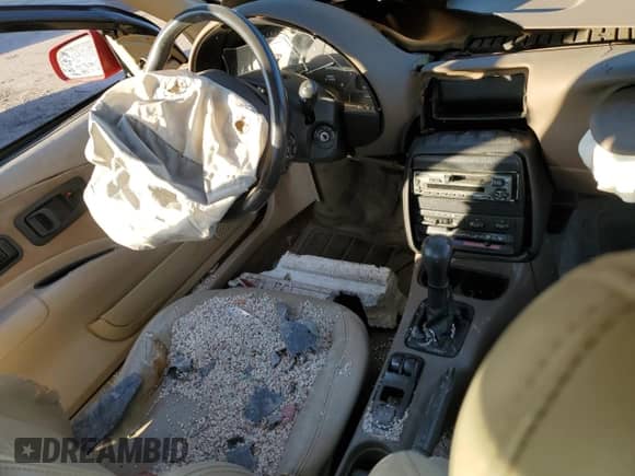 1995 Saturn SC z VIN 1G8ZG1271SZ308127, wystawiony jako Copart lot #47142725 z przebiegiem 158 207 mil mil oraz Nie do naprawy • Non repairable. Historia ofert i sprzedaży dostępna na DreamBid. Obrazek 8.