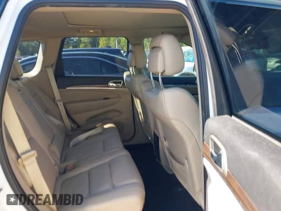 2014 Jeep Grand Cherokee Limited с VIN 1C4RJEBG0EC174233, выставлен на аукционе IAAI как лот 43251218 с пробегом 147 846 миль миль и . История ставок и продаж доступна на DreamBid. Изображение 8.