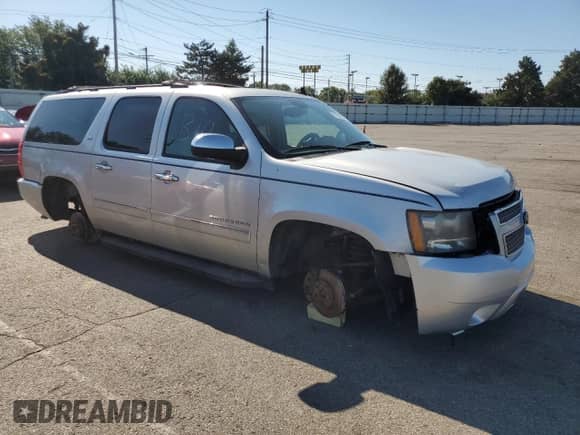 2011 Chevrolet Suburban LTZ with VIN 1GNSKKE37BR124743, listed as a Copart auction lot 71872745 with 233,253 mi miles and Clean title. Bid and sale history available at DreamBid. Image 4.