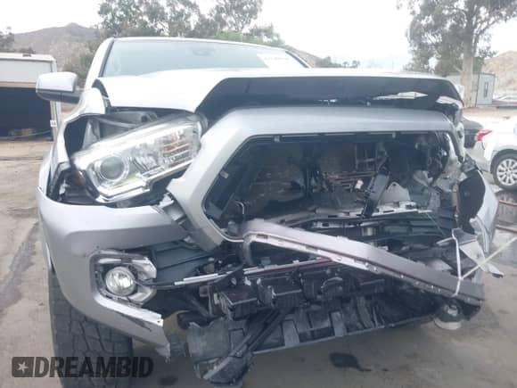 2019 Toyota Tacoma SR5 with VIN 3TMAZ5CN9KM108003, listed as a IAAI auction lot 43249340 with 80,485 mi miles and . Bid and sale history available at DreamBid. Image 18.