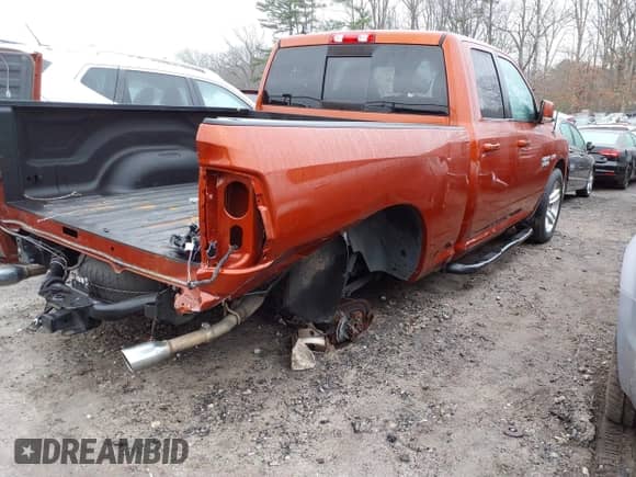 2013 Ram 1500 Sport with VIN 1C6RR6HT8DS574281, listed as a IAAI auction lot 41434698 with 61,879 mi miles and . Bid and sale history available at DreamBid. Image 4.