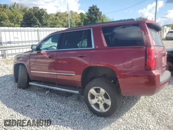 2016 Chevrolet Tahoe LT with VIN 1GNSCBKC8GR396601, listed as a Copart auction lot 84616655 with 131,971 mi miles and Salvage title. Bid and sale history available at DreamBid. Image 2.