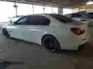 2015 BMW 7 Series 740Li with VIN WBAYE4C57FD138796, listed as a Copart auction lot 81078585 with 164,638 mi miles and Clean title. Bid and sale history available at DreamBid. Image 2.