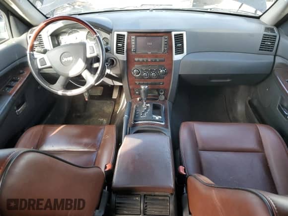 2009 Jeep Grand Cherokee with VIN 1J8HR68T39C545835, listed as a Copart auction lot 43141655 with 154,380 mi miles and Salvage title. Bid and sale history available at DreamBid. Image 8.