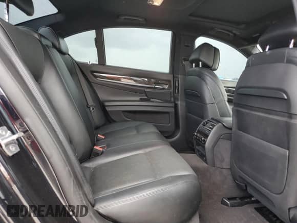 2013 BMW 7 Series 750i с VIN WBAYA8C56DC996704, выставлен на аукционе Copart как лот 64466705 с пробегом 102 278 миль миль и Списание • Salvage title. История ставок и продаж доступна на DreamBid. Изображение 10.