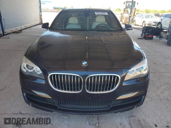 2015 BMW 7 Series 740i with VIN WBAYA6C55FGK16515, listed as a Copart auction lot 66535605 with 94,256 mi miles and Salvage title. Bid and sale history available at DreamBid. Image 5.