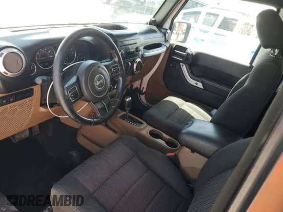 2011 Jeep Wrangler Rubicon with VIN 1J4BA6D12BL535953, listed as a Copart auction lot 59401595 with 77,451 mi miles and Salvage title. Bid and sale history available at DreamBid. Image 8.