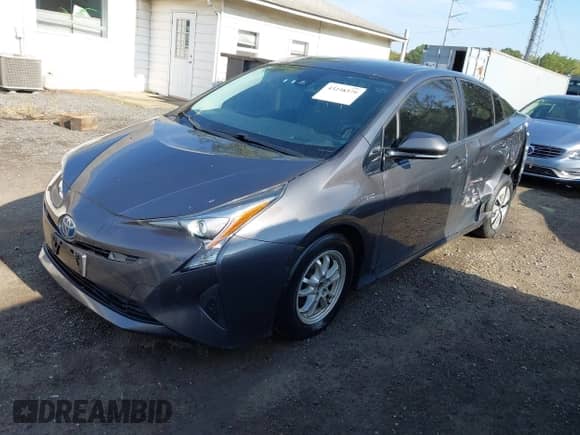 2018 Toyota Prius Two Eco with VIN JTDKARFU1J3067548, listed as a IAAI auction lot 43238379 with 146,282 mi miles and . Bid and sale history available at DreamBid. Image 2.