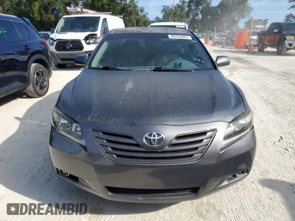 2009 Toyota Camry LE z VIN 4T1BE46K29U296523, wystawiony jako Copart lot #80359865 z przebiegiem 190 864 mil mil oraz Czysty tytuł • Clean title. Historia ofert i sprzedaży dostępna na DreamBid. Obrazek 5.