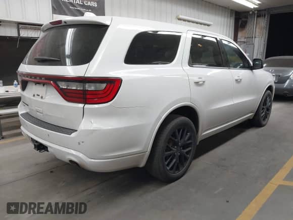 2015 Dodge Durango SXT with VIN 1C4RDJAG4FC202716, listed as a IAAI auction lot 43142717 with 169,362 mi miles and . Bid and sale history available at DreamBid. Image 4.