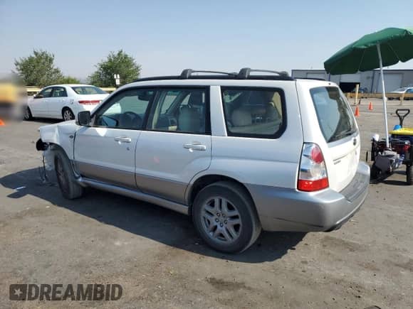 2008 Subaru Forester X L.L. Bean with VIN JF1SG67658H712847, listed as a Copart auction lot 64827395 with 132,679 mi miles and Salvage title. Bid and sale history available at DreamBid. Image 2.
