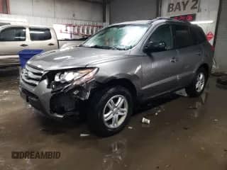 2012 Hyundai Santa Fe GLS с VIN 5XYZG4AG5CG156183, выставлен на аукционе Copart как лот 46301395 с пробегом 104 084 миль миль и Списание • Salvage title. История ставок и продаж доступна на DreamBid. Изображение 1.