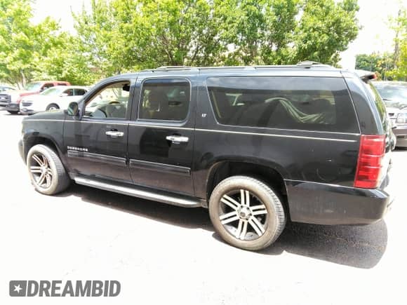 2011 Chevrolet Suburban LT with VIN 1GNSCJE0XBR386110, listed as a IAAI auction lot 42717030 with 137,053 mi miles and . Bid and sale history available at DreamBid. Image 14.