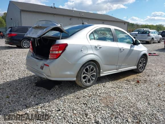 2017 Chevrolet Sonic LT with VIN 1G1JD5SH7H4138575, listed as a IAAI auction lot 43391642 with 102,347 mi miles and . Bid and sale history available at DreamBid. Image 4.