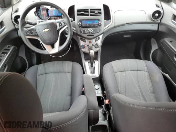 2012 Chevrolet Sonic LT с VIN 1G1JC6SBXC4200709, выставлен на аукционе Copart как лот 59656395 с пробегом 85 289 миль миль и Чистый • Clean title. История ставок и продаж доступна на DreamBid. Изображение 8.