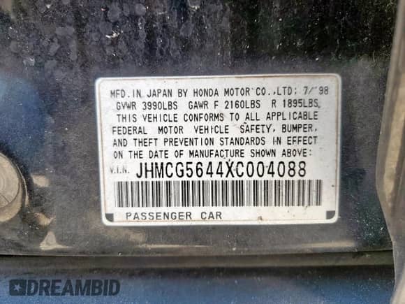 1999 Honda Accord LX with VIN JHMCG5644XC004088, listed as a Copart auction lot 84821185 with 150,948 mi miles and Salvage title. Bid and sale history available at DreamBid. Image 13.