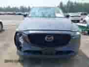 2023 Mazda CX-5 S Carbon Edition z VIN JM3KFBCM5P0179462, wystawiony jako IAAI lot #42451109 z przebiegiem 14 170 mil mil oraz . Historia ofert i sprzedaży dostępna na DreamBid. Obrazek 12.