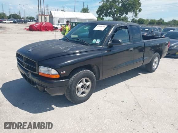 1998 Dodge Dakota SLT z VIN 1B7GL22Y1WS502985, wystawiony jako IAAI lot #42600748 z przebiegiem Nie podano mil oraz . Historia ofert i sprzedaży dostępna na DreamBid. Obrazek 2.
