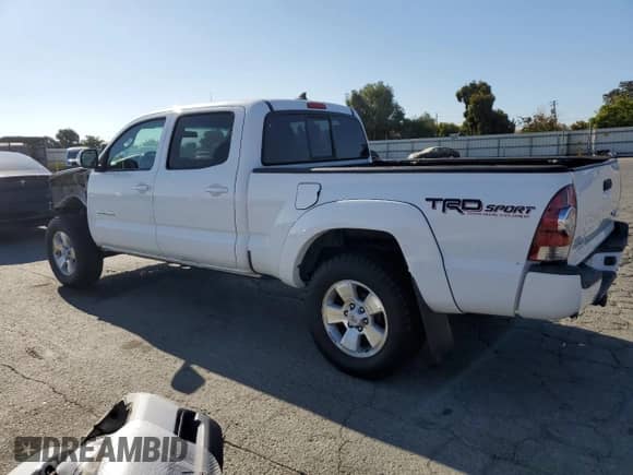 2014 Toyota Tacoma PreRunner with VIN 3TMKU4HN3EM040789, listed as a Copart auction lot 70190765 with 155,533 mi miles and Salvage title. Bid and sale history available at DreamBid. Image 2.