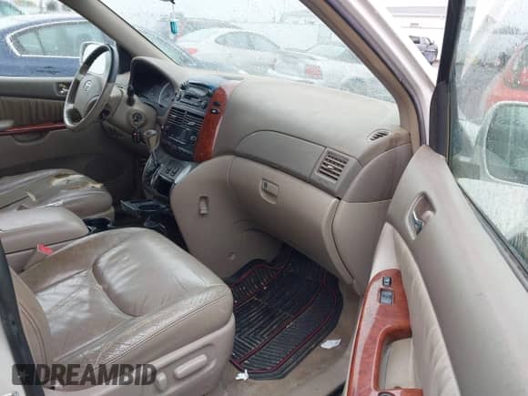 2005 Toyota Sienna XLE z VIN 5TDBA22C65S041181, wystawiony jako IAAI lot #42928380 z przebiegiem 268 568 mil mil oraz . Historia ofert i sprzedaży dostępna na DreamBid. Obrazek 5.