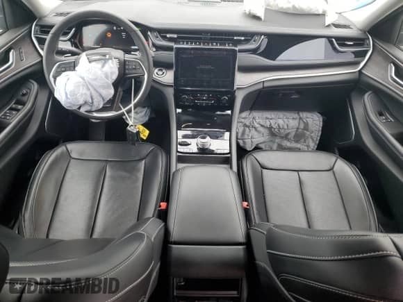 2023 Jeep Grand Cherokee with VIN 1C4RJYB64P8905194, listed as a Copart auction lot 69561485 with 10,071 mi miles and Salvage title. Bid and sale history available at DreamBid. Image 8.