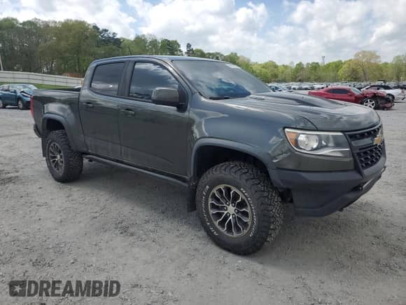 2018 Chevrolet Colorado 4WD ZR2 с VIN 1GCPTEE11J1194070, выставлен на аукционе Copart как лот 52037025 с пробегом 104 858 миль миль и Чистый • Clean title. История ставок и продаж доступна на DreamBid. Изображение 4.